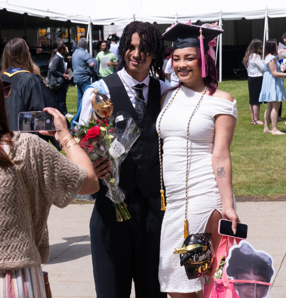 Two graduates, mother and son Rocio and Izeah at NECC's Commencement 2026