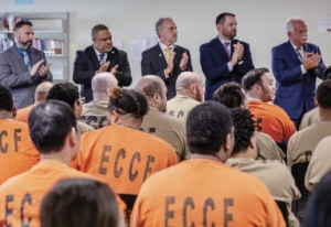 NECCPresident Lane Glenn and Sheriff Kevin Coppinger (right) attended a ceremony at the Middleton Jail and House of Correction recognizing inmates who have completed educational programs offered by Northern Essex. Programs include ESOL, HiSET preparation, non-credit academic electives, and credit-bearing college courses.