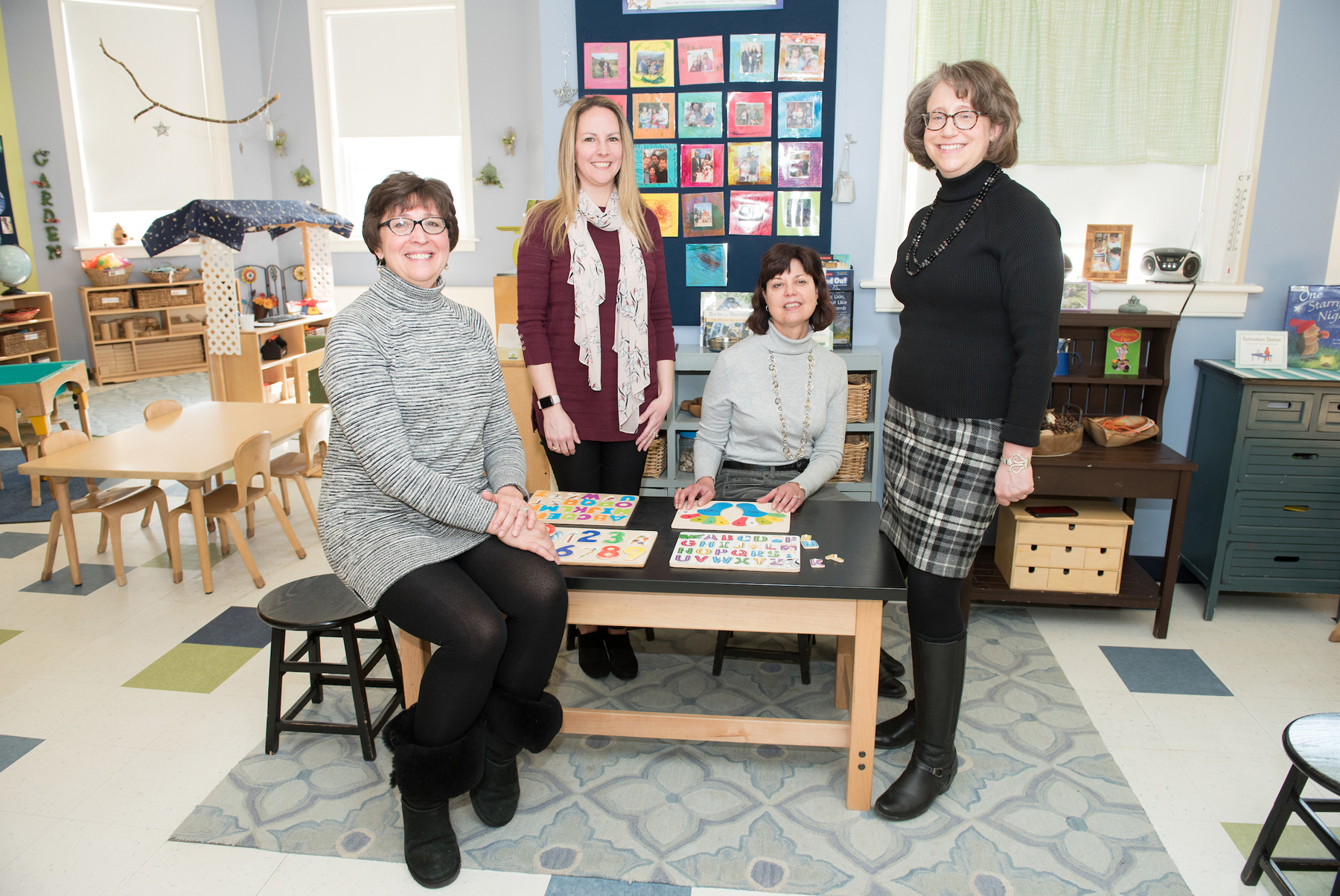 Carol, Jody, Gail and Kim in an early childhood classroom