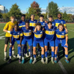 soccer players lined up in NECC jerseys