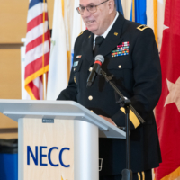guest veteran speaker stands at podium