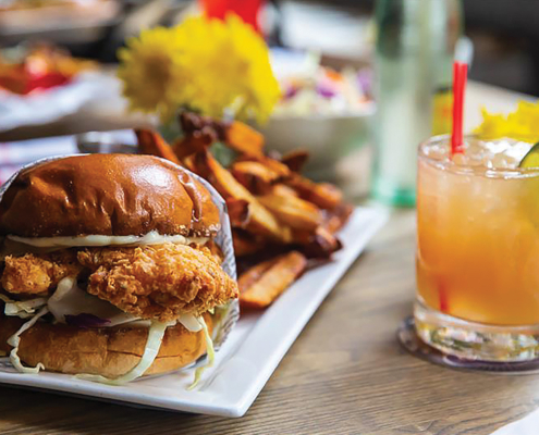 The Corpus Crispy Chicken Sandwich with a drink