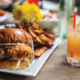 The Corpus Crispy Chicken Sandwich with a drink