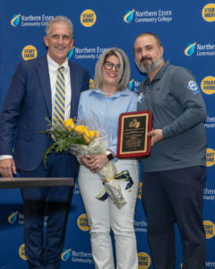 From left to right: NECC President Lane Glenn, NECC alumna Elizabeth Stratton, NECC men's basketball coach Darren Stratton at the 2026 Men's Basketball Championship Celebration