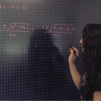 A student using a smart board