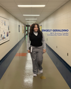 NECC student Engely walking down hallway