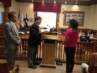 Eva Caraballo, '12, was recognized by the Lawrence City Council