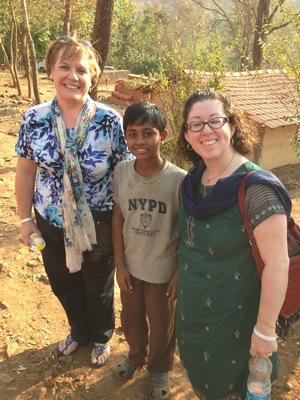 Cheryl Goodwin and Dina Brown with Vinod patil, a student at the Kalkeri Sangeet Vidyali School.