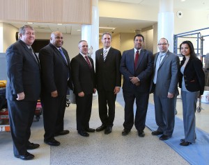 Bill Moynihan, chair of the NECC Board of Trustees, Lawrence Mayor Dan Rivera, MA Secretary of Education Matthew Malone, NECC President Lane Glenn, State Representative Marcos Devers, State Representative Frank Moran, and Lawrence City Councilor Oneida Aquino.