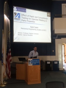Nabil Saleh of Methuen a mechanical engineering student at NECC makes his final presentation during UMass Lowell's REU summer program.