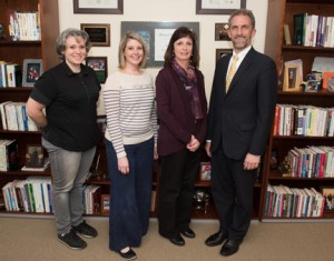 NECC faculty and staff members Anne Eshbaugh, Elle Yarborough, and Judith Pollock-Ciampi wee congratulated by NECC President Lane Glenn on receiving the quarterly NECC Employee Recognition Award. 