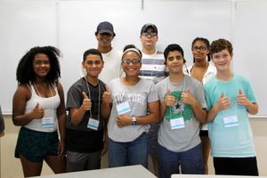 The Microscopes - campers in Engineering Professor Paul Chanley's class give a thumb's up at the end of their day at Technology Camp.