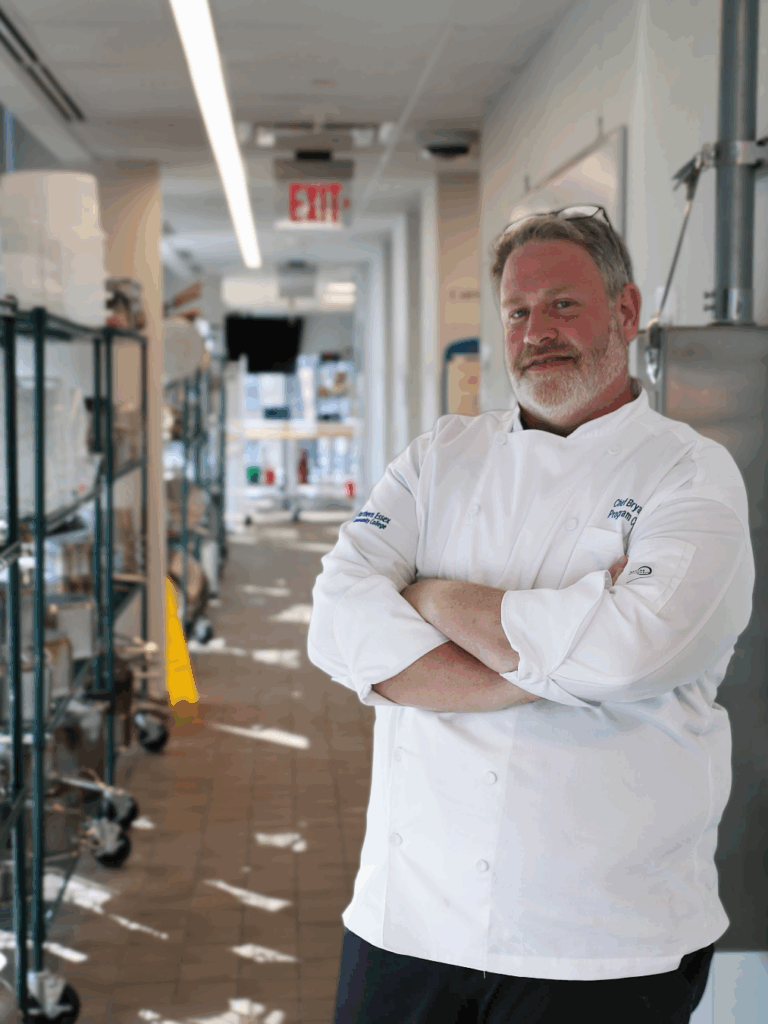 Chef Bryan Philbrook posing in the kitchen at The Heights Haverhill campus