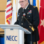 guest veteran speaker stands at podium