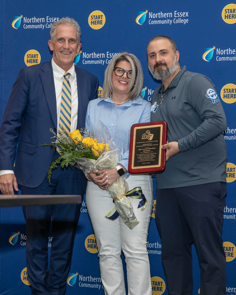 From left to right: NECC President Lane Glenn, NECC alumna Elizabeth Stratton, NECC men's basketball coach Darren Stratton at the 2026 Men's Basketball Championship Celebration