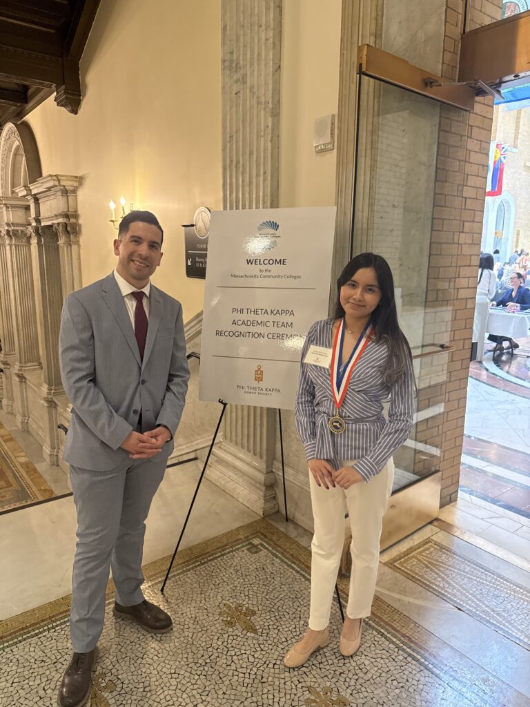 Andy Vargas stands with Dayana at the state house 