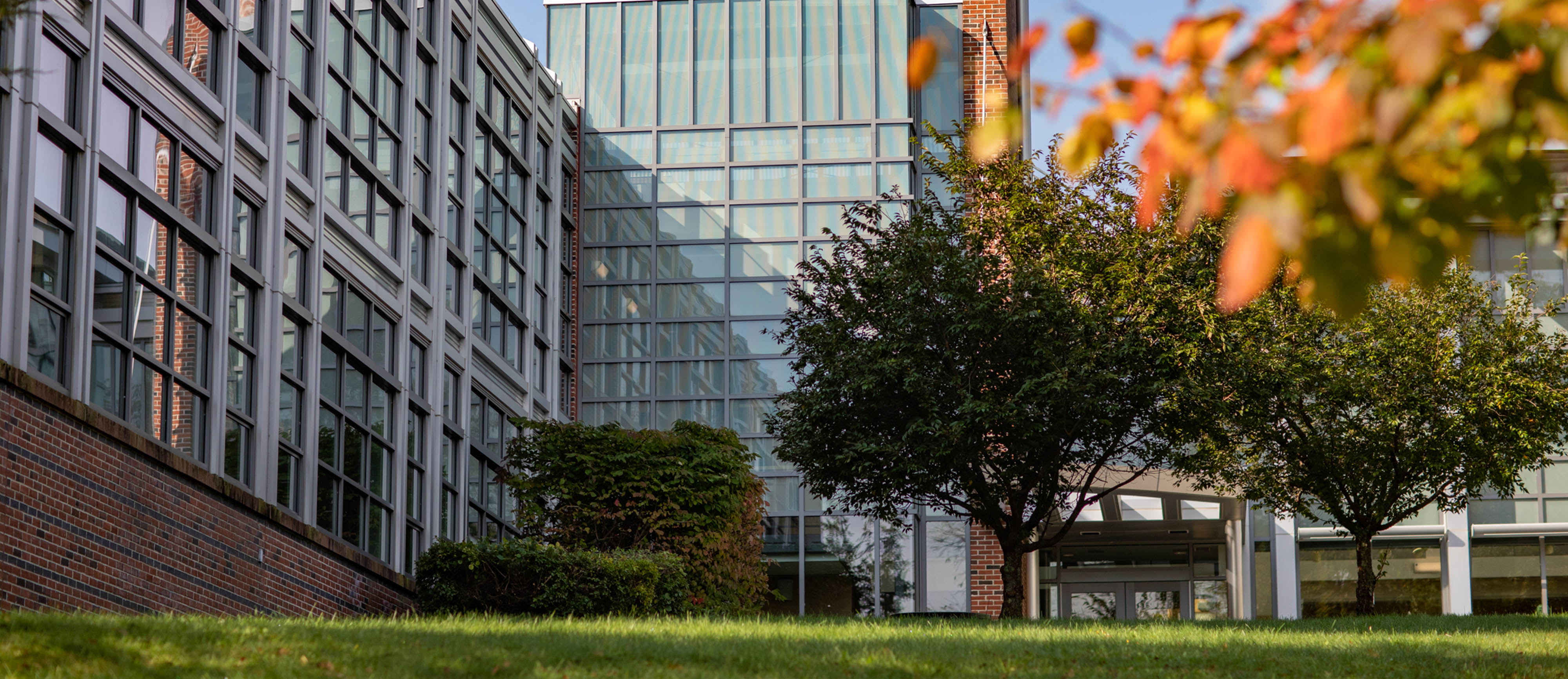 Haverhill Tech Center campus in the Fall with Autumn leaves in the foreground
