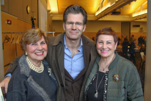 Women of NECC President Gerri Murphy, author Andre Dubus, and Jean Poth, vice president of NECC's Institutional Advancement.  