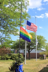 The Pride Flag was flown beside the American Flag on Thursday, June 23, as NECC paused for a moment of silence for the Orlando shooting victims.