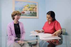 Clinical research coordinators review information with clients in private consent rooms.