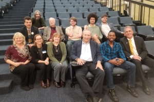 Larry Summers, president emeritus of Haverhill, posted on the chairs in lecture hall A with NECC faculty, staff, and students. 