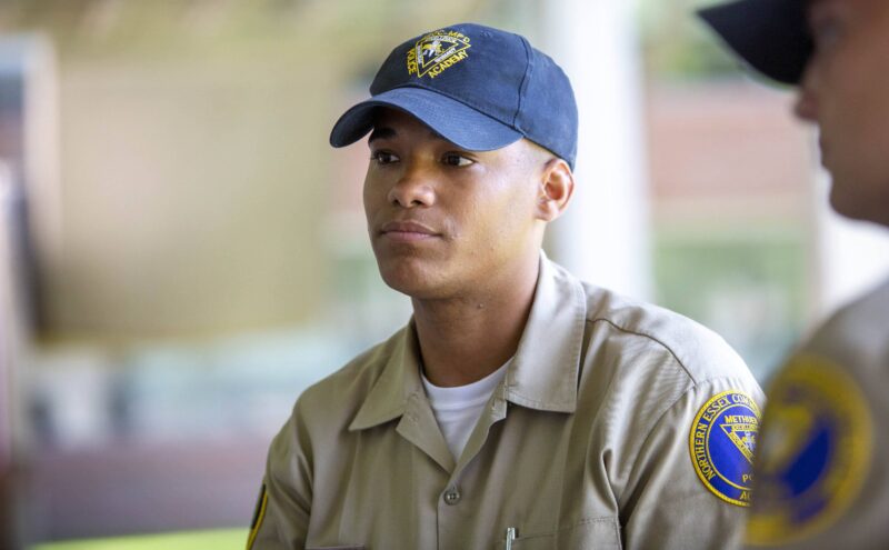 A photo of student officer Jefferson De La Cruz, sitting in a polie academy training session